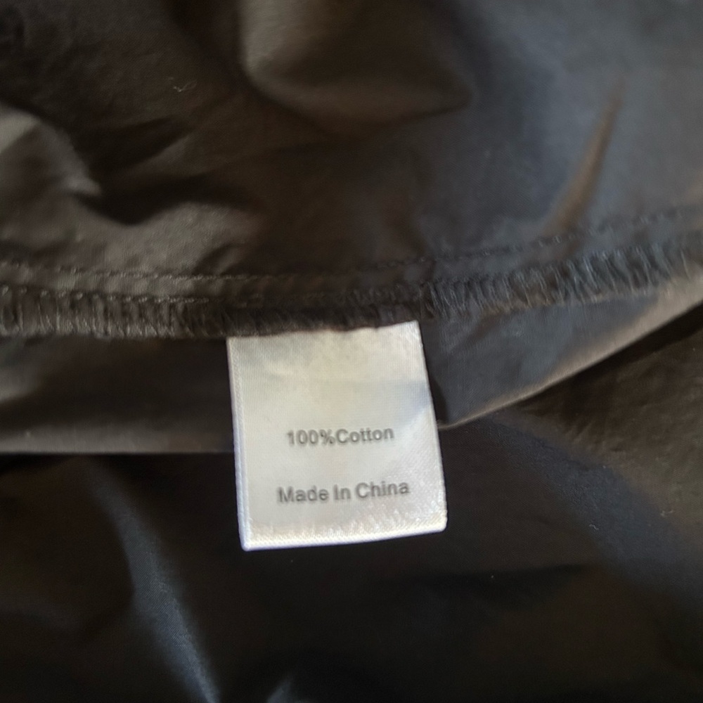 Tuckernuck Alice Dress is a black, elevated midi dress. - Picture 8 of 10